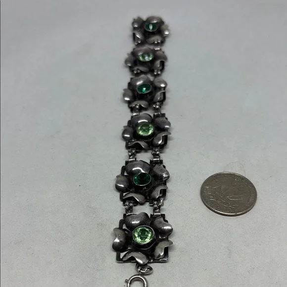 Gorgeous Hobe sterling silver floral bracelet.